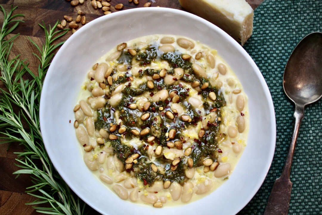 White beans with rosemary pesto and garnished with toasted pine nuts--super simple with canned beans and oh so tasty!