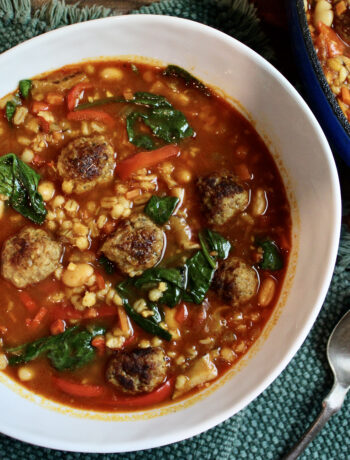 Rich & hearty Barley Mushroom Soup with meatballs and spinach. A fall favorite! Easy, delicious & great reheated as leftovers.