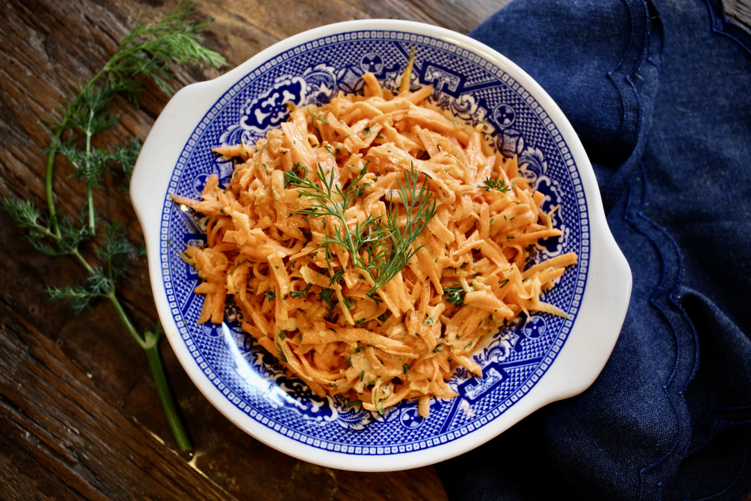 Carrot Slaw with an Herby Tahini Dressing - super easy and so delicious! Perfect for weeknights and meal prep.