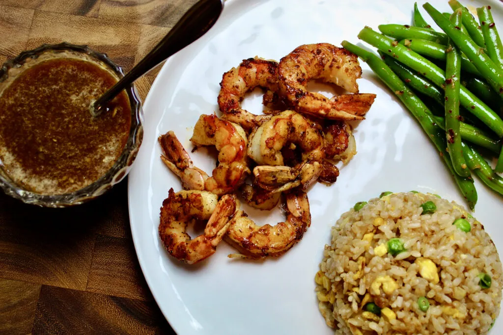 Learn how to make homemade ginger sauce. Served with sauteed shrimp, egg fried rice, and garlicky green beans.