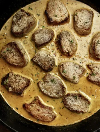 Pork Marsala made with a creamy-mustard sauce and pork medallions. The sauce is the key here, but feel free to substitute any protein of your choice!