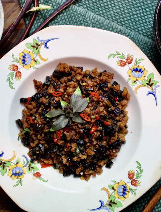 Chinese yard long beans stir fry with ground pork and a delicious umami-packed sauce. Serve with steamed white rice. Yum!
